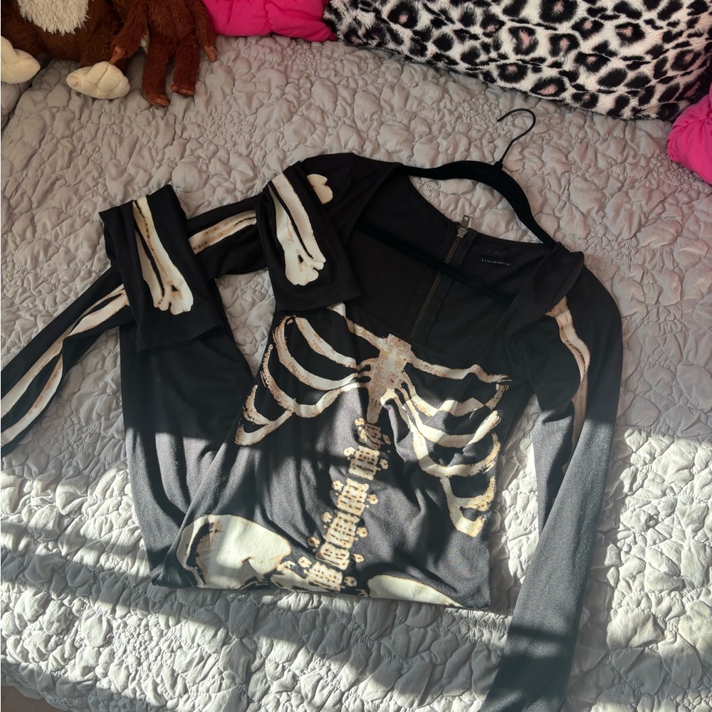 Urban Outfitters out from under discontinued skeleton glow in the dark bodysuit